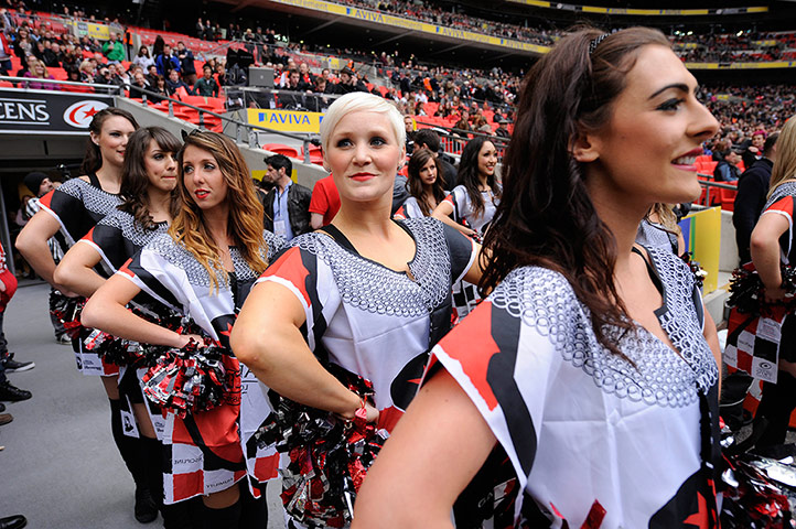 Saracen v Harlequins : The Saracens cheerleaders wait to come onto the pitch.