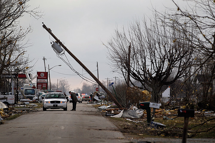 Midwest tornado: A police vehicle blocks entry to the town of Holton, Indiana 