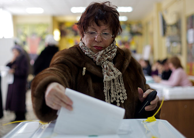 Russian election: Moscow: Svetlana Pavlova votes at a polling station in the capital