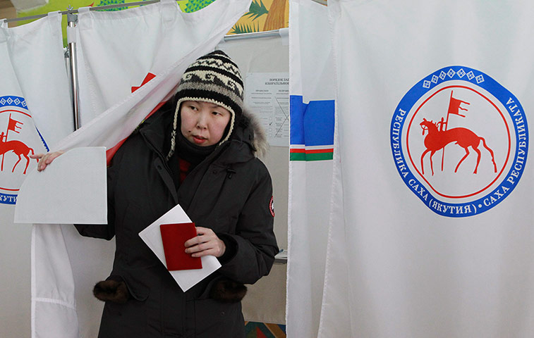 Russian election: Yakutsk, Siberia: A voter leaves a booth