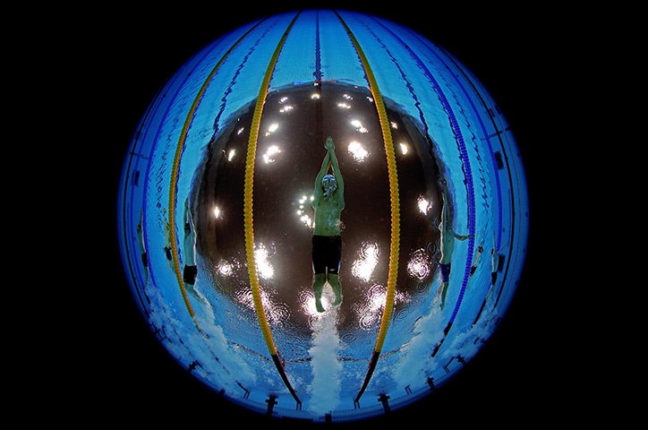 24 hours in pictures: London, UK: Ieuan Lloyd competes in the Men's 200m Freestyle