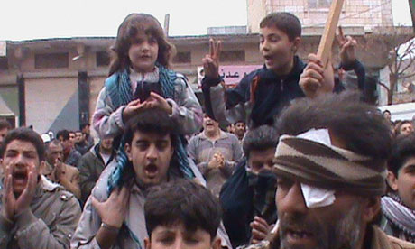 Demonstrators protest against Syria's President Bashar Al-Assad