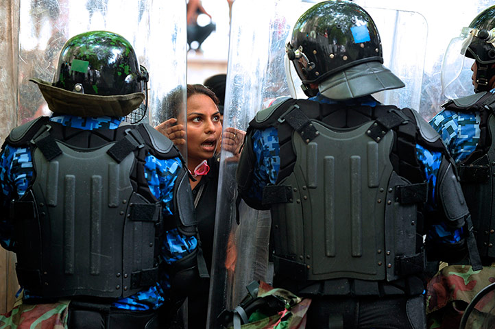 Women protesting: Woman protesting in the Maldives