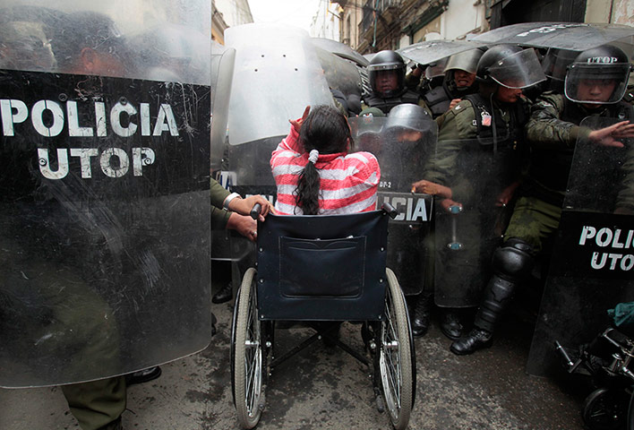 Women protesting: A physically disabled woman during a protest