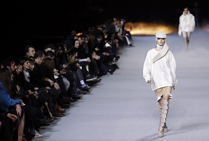 24 Hours: Paris, France: A model presents a creation by Kanye West