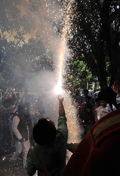 24 Hours: Uttar Pradesh, India: Samajwadi Party supporters burst crackers