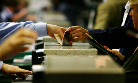 Passports are checked at Gatwick Airport in West Sussex.