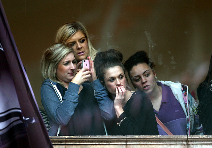 Royals in Leicester: The crowds takes every vantage point to view the Royal visit