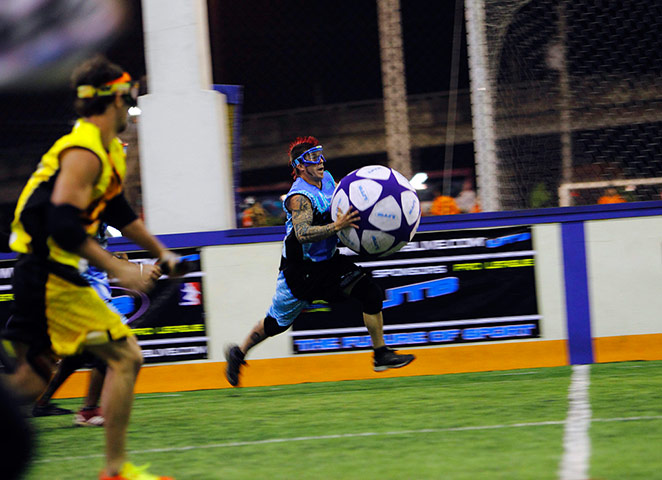 Best of the week in sport: L.A. Nightlight's Thomas Taylor scores during an Ultimate Tak Ball game