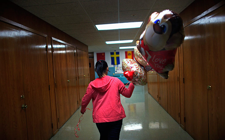 From the agencies: Jutarat Sawatpoon from Thailand, walks through the halls 