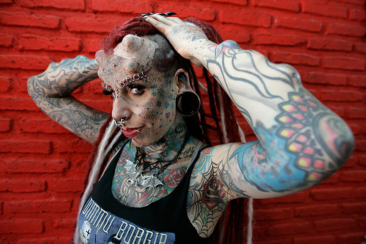 24 hours in pictures: Guadalajara, Mexico: Maria Jose Cristerna poses for a photograph