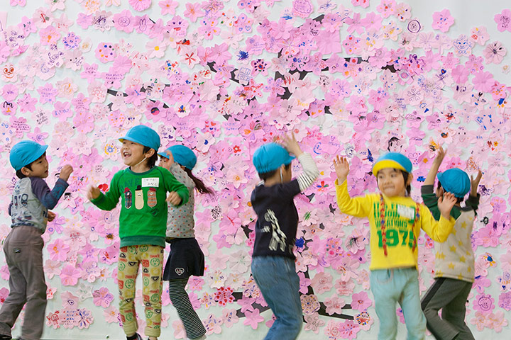 Japan tsunami: Children play in the Red Cross' 'Smile Park', Fukushima prefecture, Japan