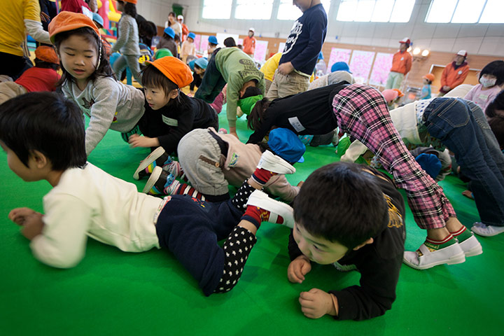 Japan tsunami: Children play in the Red Cross' 'Smile Park', Fukushima prefecture, Japan