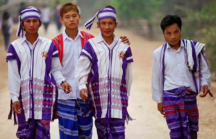 Burma elections: People arrive at a polling station in Kawhmu township