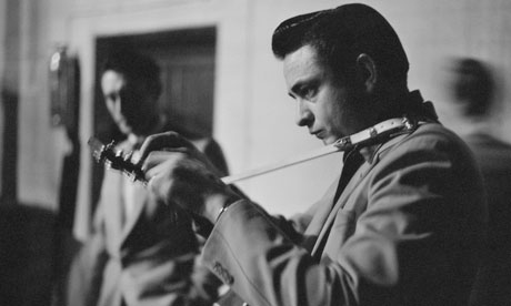 Johnny Cash Tuning His Guitar