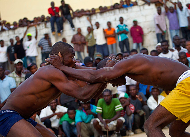 Haiti - A longer view: Jean Phillipe and Venes Pierre take part in a fight