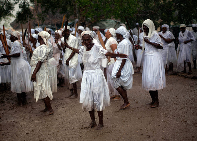 Haiti - A longer view: Haitians take part in a Voodoo festival 