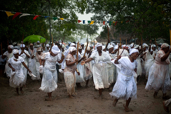 Haiti - A longer view: Haitians take part in a Voodoo festival