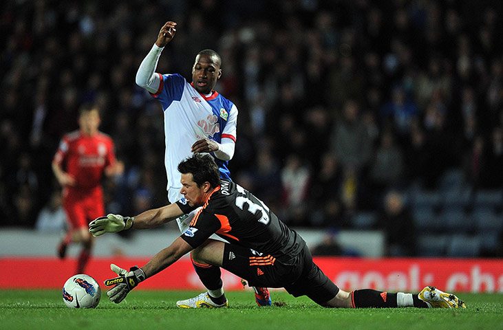 Blackburn v Liverpool: Liverpool's goalkeeper Alexander Doni fouls Blackburn Rovers' David Hoilett