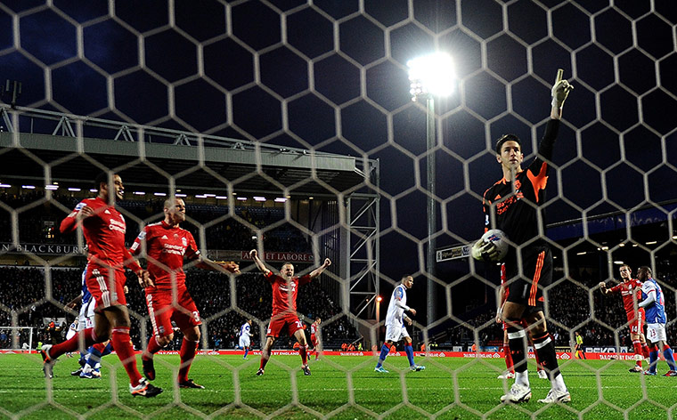 Blackburn v Liverpool: Brad Jones of Liverpool celebrates saving a penalty kick