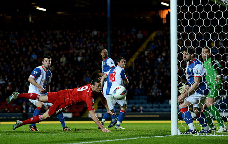 Blackburn v Liverpool: Andy Carroll of Liverpool heads wide of goal against Blackburn Rovers