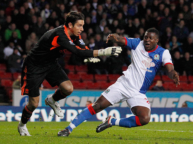 Blackburn v Liverpool: Liverpool's Jones pushes over Blackburn Rovers' Yakubu for a penalty