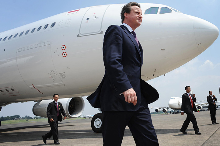 Cameron in Asia: Prime Minister David Cameron in front of a Garuda Indonesia Airlines Airbus