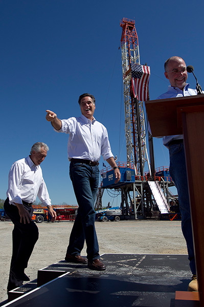 Pointing Mitt: Mitt Romney gestures as he takes the stage in Shreveport, Louisiana
