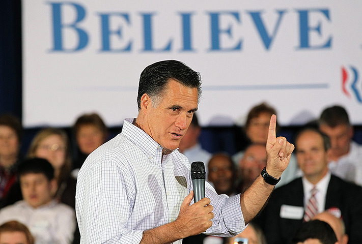 Pointing Mitt: Mitt Romney speaks during a town hall style meeting in Middleton, Wisconsin