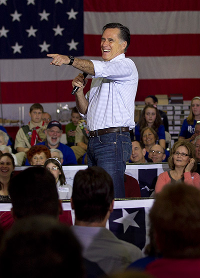 Pointing Mitt: Mitt Romney laughs during a campaign stop in Muskego, Wisconsin