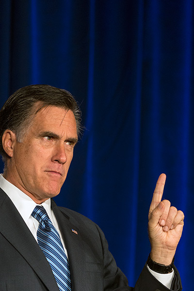 Pointing Mitt: Mitt Romney speaks to a crowd at the Reagan/Lincoln Day forum in Pewaukee
