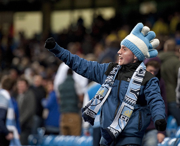 Wednesday footie: Manchester City fan celebrates