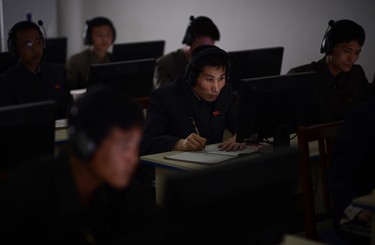 From the agencies: A worker checks a computer at the control room of a factory in Pyongyang