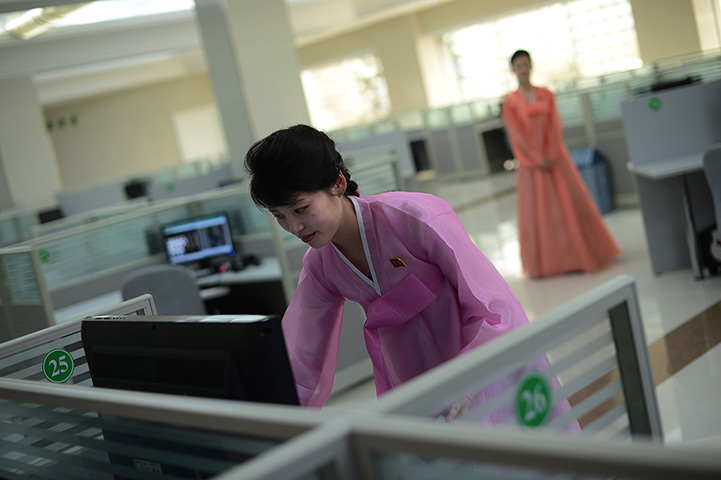 From the agencies: A North Korean woman checks a computer a at music software company 