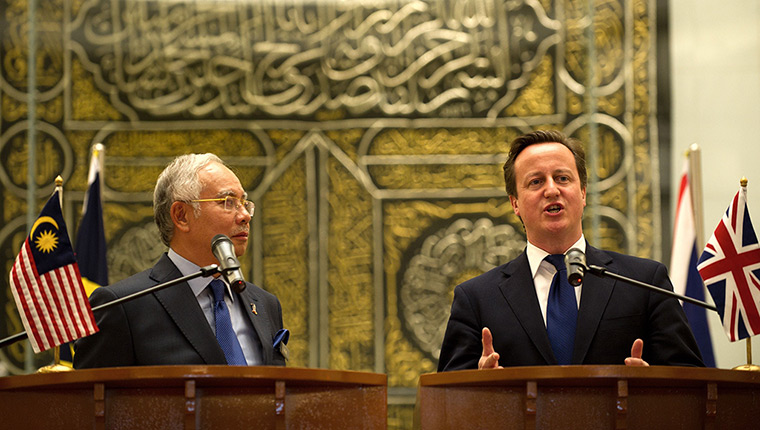 David Cameron in Asia: David Cameron speaks as Malaysia's Prime Minister Nazib Razak looks on