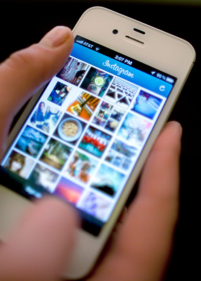 Week in Business: Instagram is used on an iPhone