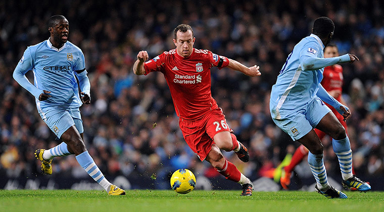 liverpool signings: Charlie Adam of Liverpool competes with Yaya Toure and Kolo Toure