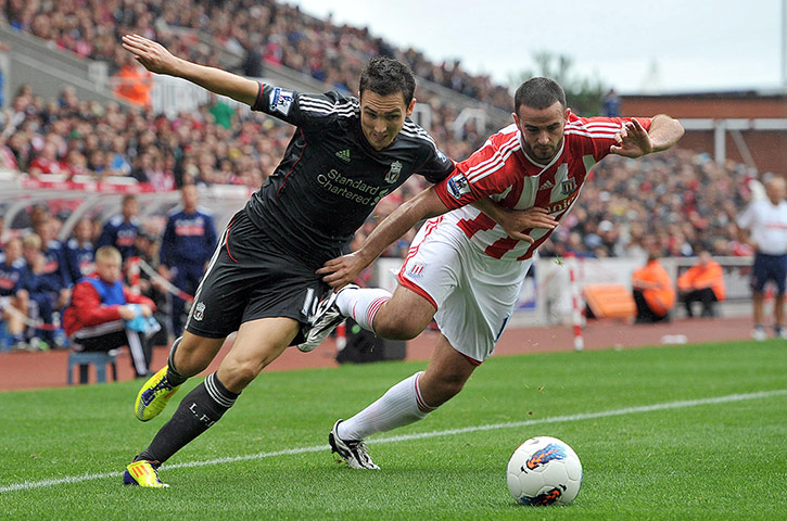 liverpool signings: Liverpool's Stewart Downing and Stoke City's Marc Wilson vie for the ball