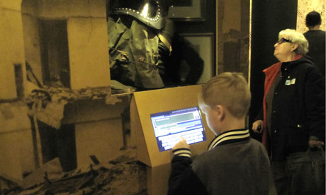 child using IWM kiosk