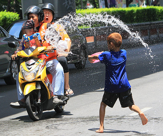 24 hours in pictures: Thailand celebrates the new year with a water festival