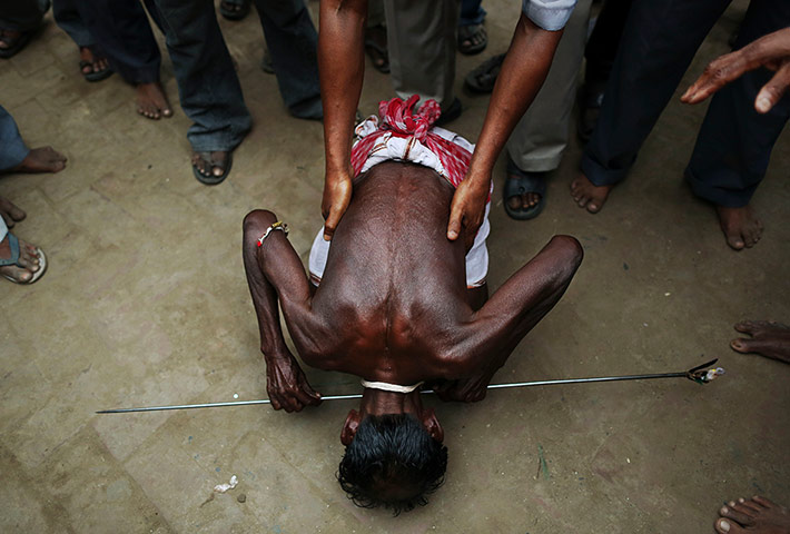 24 hours in pix: Hindu devotee