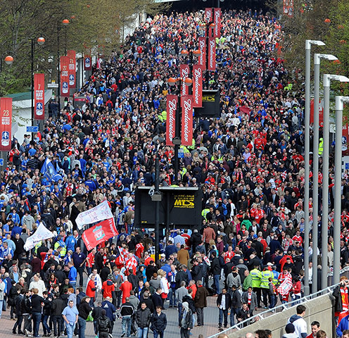 fa cup semi: Fans arriving at Wembley Stadium before the FA Cup semi-final 