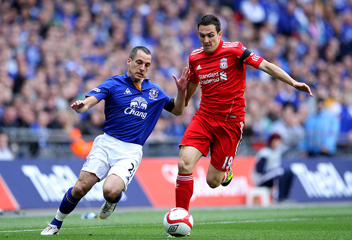 fa cup semi: Stewart Downing steams down the wing as Leon Osman attempts to tackle