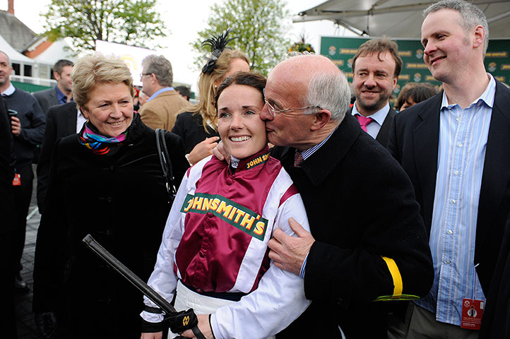 National: Katie Walsh is kissed by her father and trainer of her horse Seabass