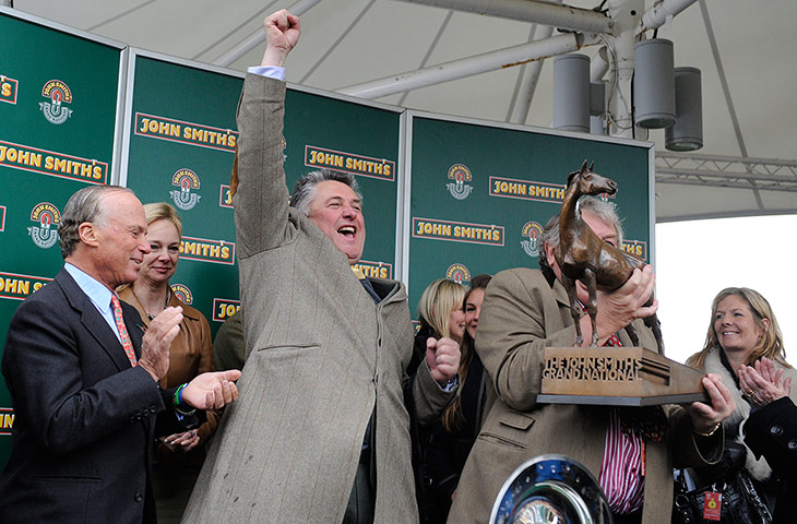 National: Trainer Paul Nicholls celebrates victory on Neptune Collonges