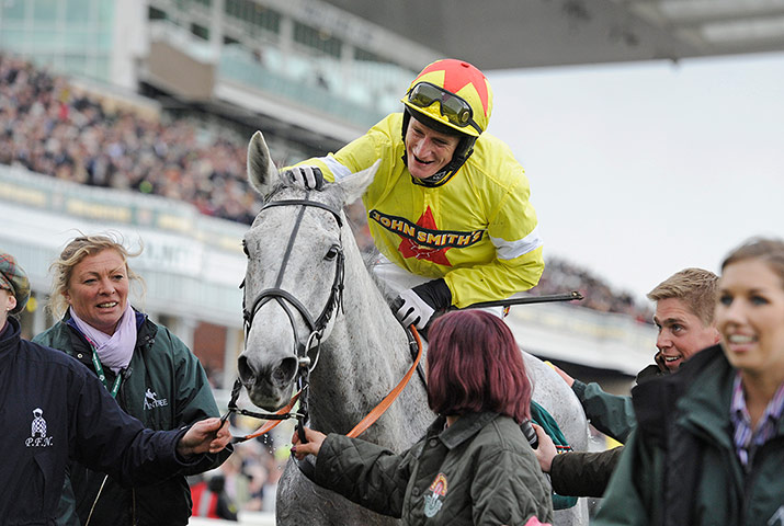 National: Neptune Collonges gets a well deserved pat by jockey Darryl Jacob