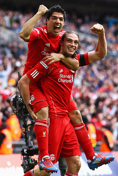 FA CUP SEMI: Andy Carroll celebrates with his fellow goalscorer Luis Suarezl