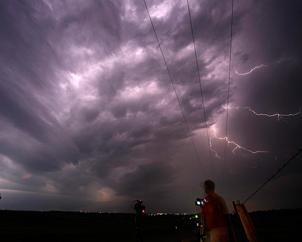 Tornados: Storm chaser photographer Brad Mack takes photos of a tornado super cell