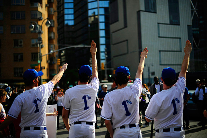 24 hours: New York, US: Members of the Occupy Wall Street participate in a rally