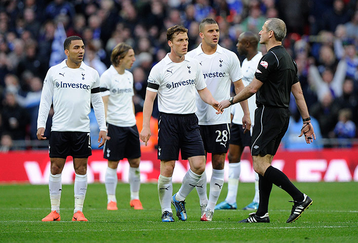 Tottenham v Chelsea: Tottenham players surround referee Martin Atkinson 
